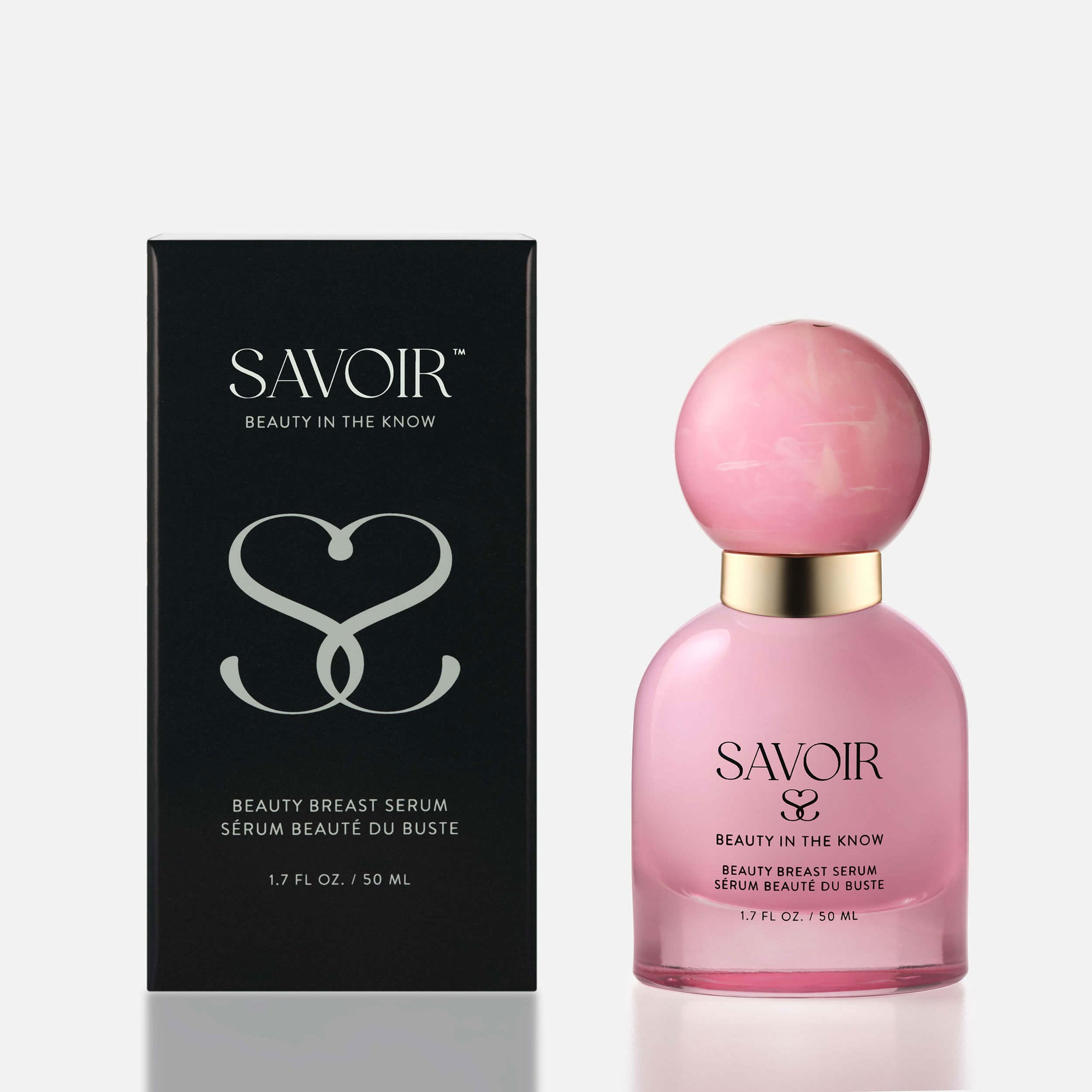 SAVOIR Beauty Breast Serum bottle next to its sleek black packaging box featuring the SAVOIR logo.